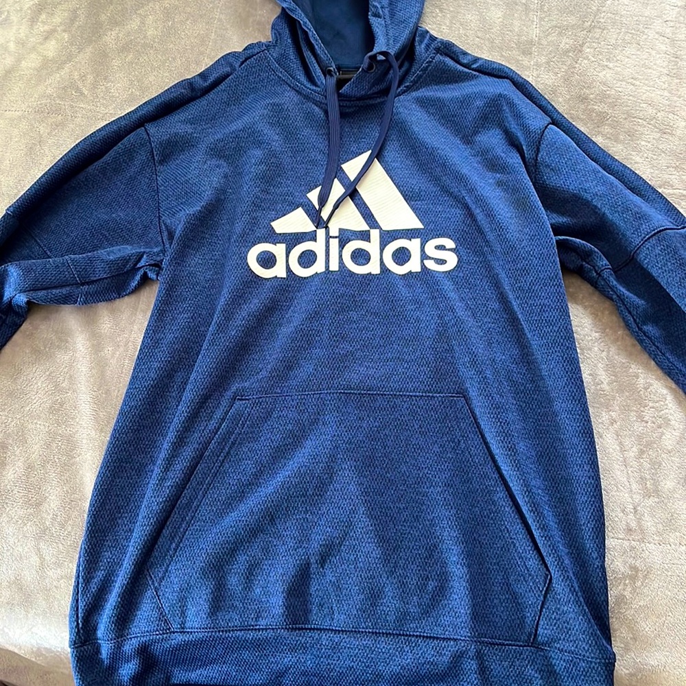 Mens adidas hoodie size medium selling for 15$